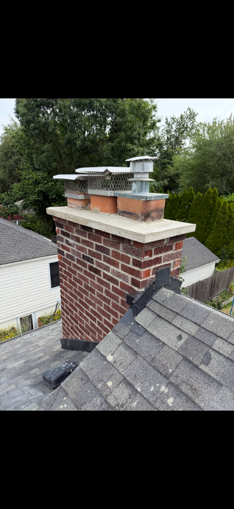 Chimney crown and flue cap by DNT Masonry